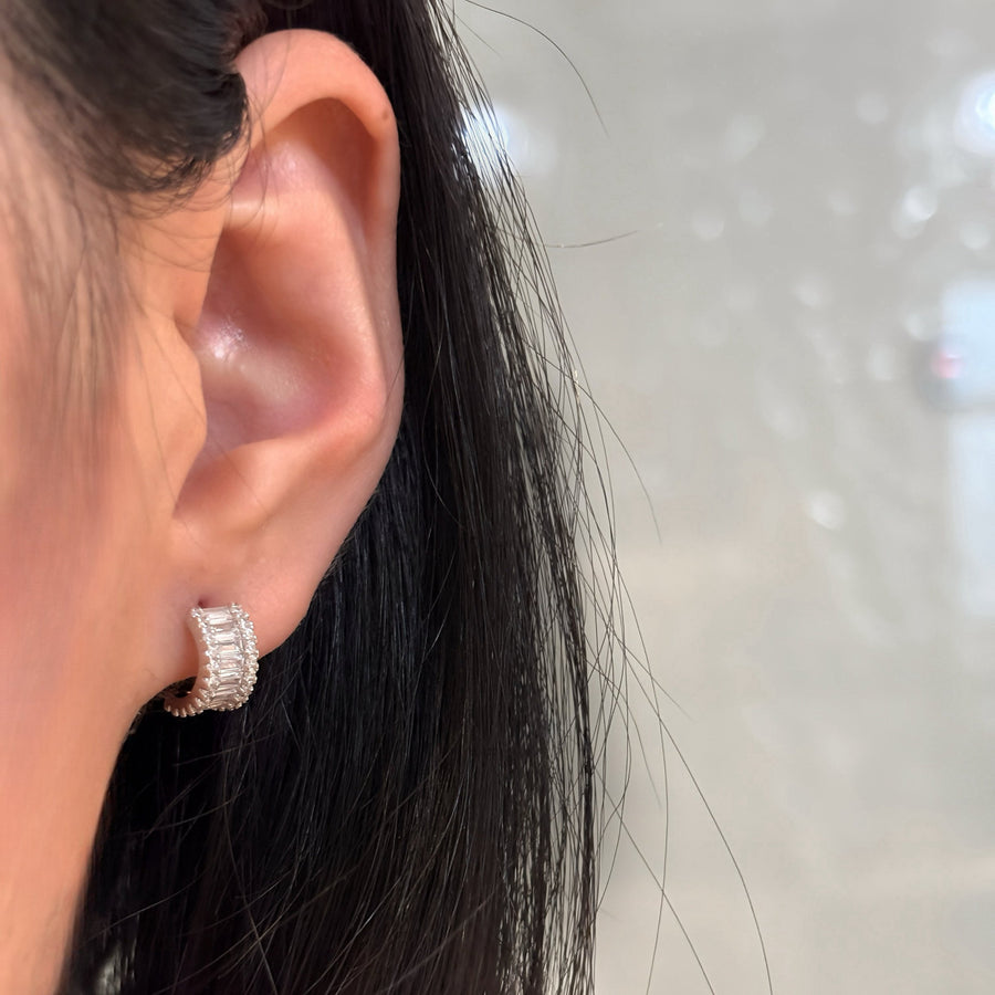 The silver arc elegance earrings, a stunning combination of timeless design and modern luxury. Perfect for any occasion. 925 silver stud earrings.