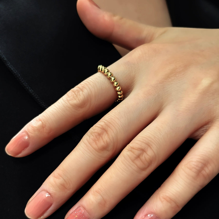 This gold vermeil beaded ring features a sleek and timeless design, perfect for everyday wear or special occasions. 