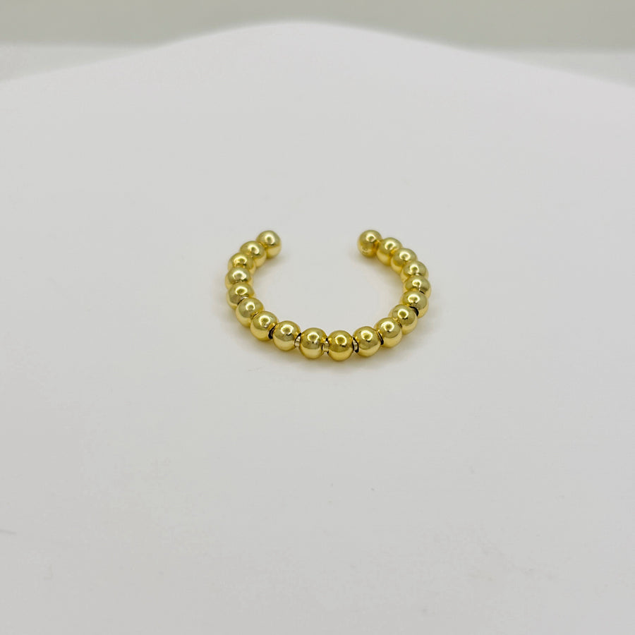 This gold vermeil beaded ring features a sleek and timeless design, perfect for everyday wear or special occasions. 