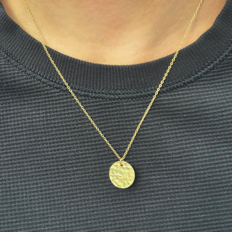 925 silver necklace. Simplicity meets elegance with this hammered gold disc pendant, designed to add a subtle yet striking touch to your everyday look. Crafted with a textured finish, this minimalist gold necklace is a timeless piece that pairs effortlessly with any outfit.