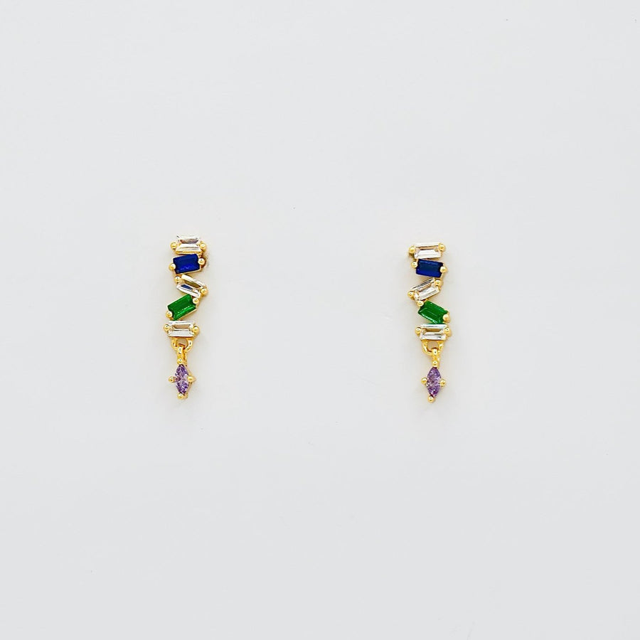 These elegant 925 silver earrings feature a vertical arrangement of cubic zircon in a gold setting, showcasing a sequence of blue, green, and clear cubic zircon, with a small purple gem at the bottom. Perfect for adding a touch of sophistication and color to any outfit, these earrings are a must-have for those who love unique and vibrant accessories. 