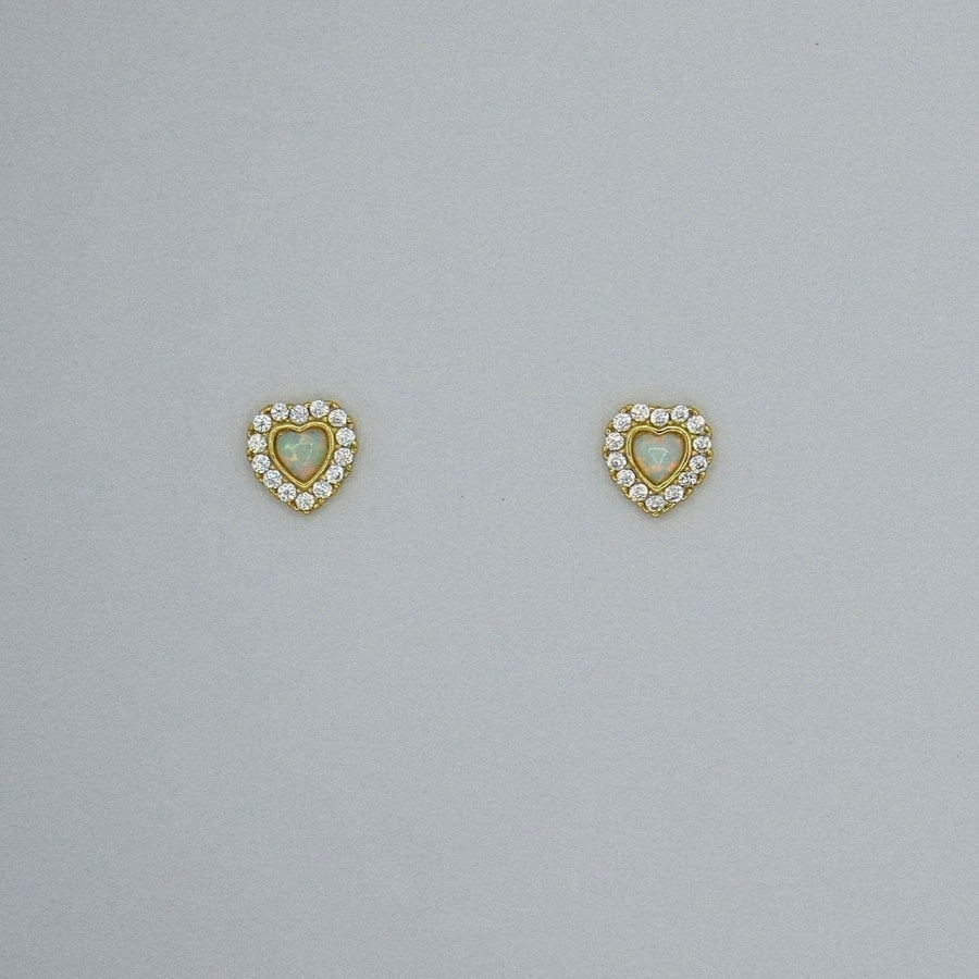 925 silver earrings. Add a touch of elegance to your style with these heart-shaped stud earrings, featuring a heart opal center surrounded by sparkling cubic zircon. Perfect for any occasion, these dainty earrings radiate timeless charm and sophistication. 