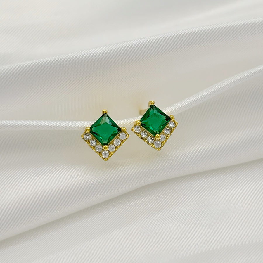 925 silver earrings. These exquisite square emerald stud earrings feature a radiant green gemstone encased in a dazzling halo of sparkling cubic zirconia. Crafted with a gold-plated finish, they offer timeless elegance and a luxurious touch to any outfit. 