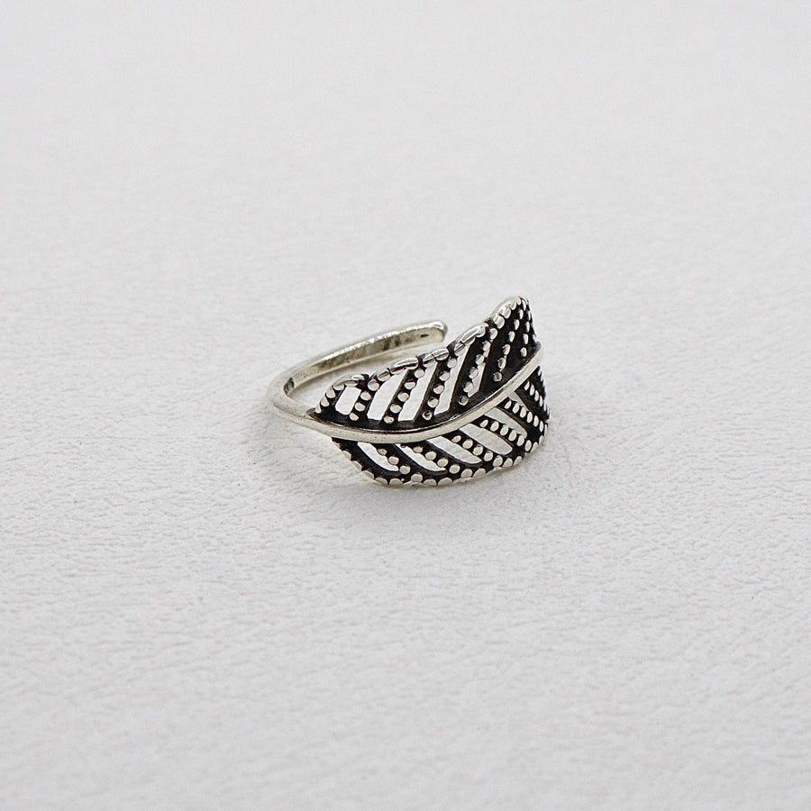 925 Silver Ring. The Enchanted Leaf Sterling Silver Ring, a masterpiece that encapsulates the mystique and allure of the night. The ring is adjustable and can fit various sizes. 