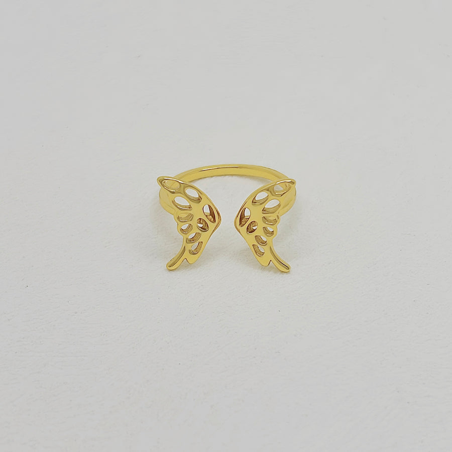 925 Silver Adjustable Ring. This butterfly-inspired ring features intricately crafted openwork wings, symbolizing grace and transformation. Perfect for both casual and formal looks.