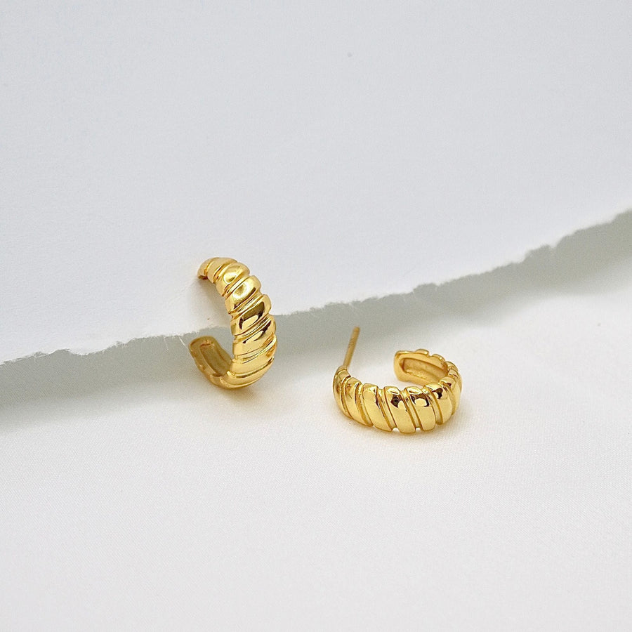 The gold croissant stud earrings add a touch of luxury to any outfit, making them perfect for both everyday wear and special occasions. Simple, timeless, and effortlessly chic, the earrings are a must-have for every jewelry lover.