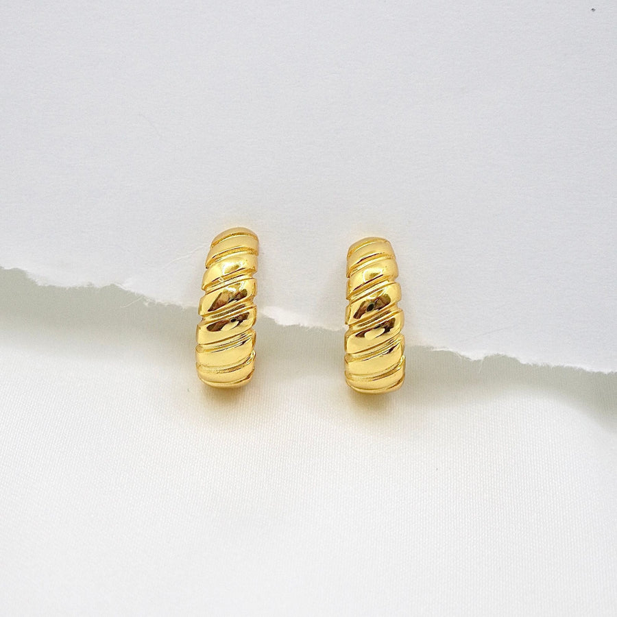 The gold croissant stud earrings add a touch of luxury to any outfit, making them perfect for both everyday wear and special occasions. Simple, timeless, and effortlessly chic, the earrings are a must-have for every jewelry lover.