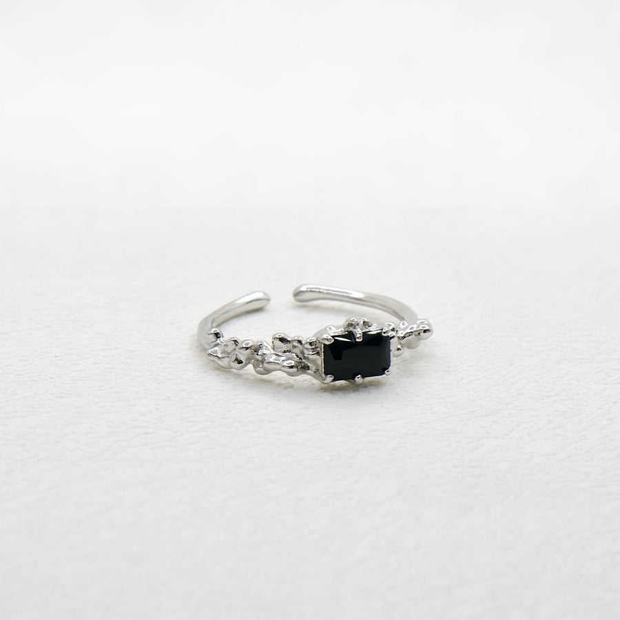 Add a touch of elegance to your look with this unique and stylish irregular face ring, featuring a lava texture and sparkling cubic zirconia inlay. Crafted from high-quality S925 sterling silver 