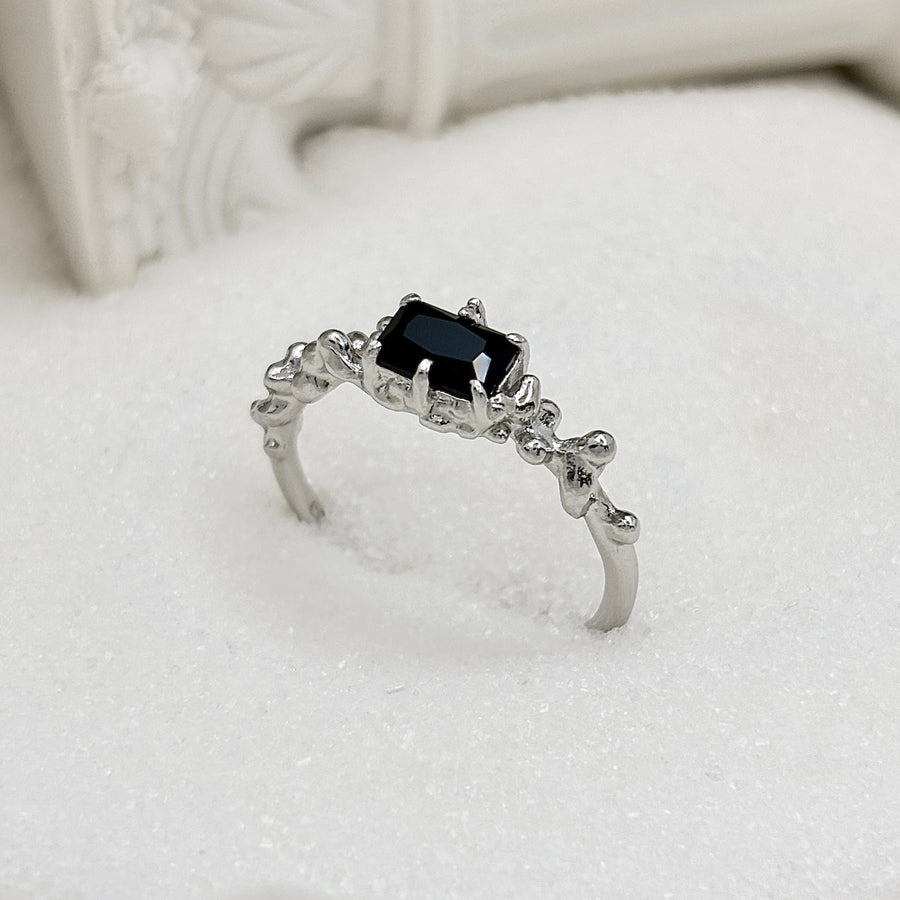 Add a touch of elegance to your look with this unique and stylish irregular face ring, featuring a lava texture and sparkling cubic zirconia inlay. Crafted from high-quality S925 sterling silver 