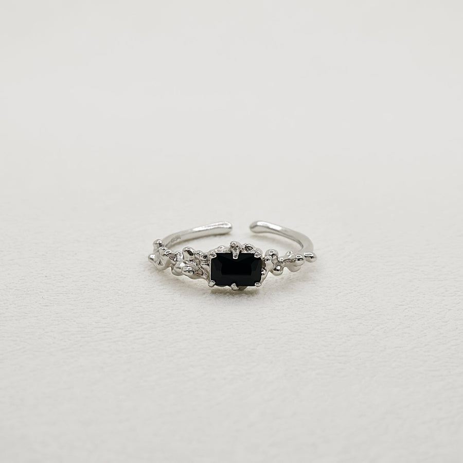 Add a touch of elegance to your look with this unique and stylish irregular face ring, featuring a lava texture and sparkling cubic zirconia inlay. Crafted from high-quality S925 sterling silver 