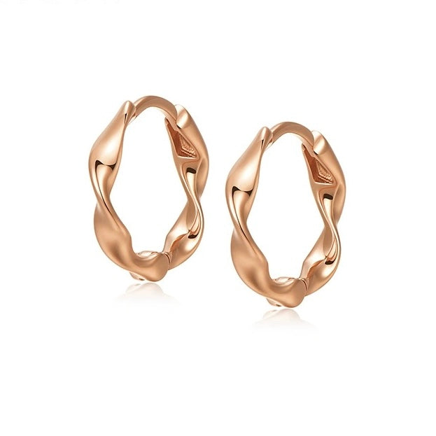 These sleek Mobius-inspired earrings feature a unique twisted design crafted in 925 silver, symbolizing infinity and timeless elegance. Perfect for adding a modern, minimalist touch to your everyday look or special occasions. 