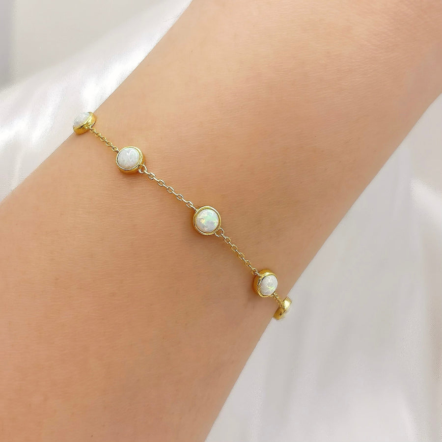 Elevate your elegance with this stunning opal bracelet, featuring radiant opals set in a delicate gold vermeil chain for a timeless look. Perfect for any occasion, this opal bracelet brings a touch of sophistication and luminous charm to your jewelry collection.