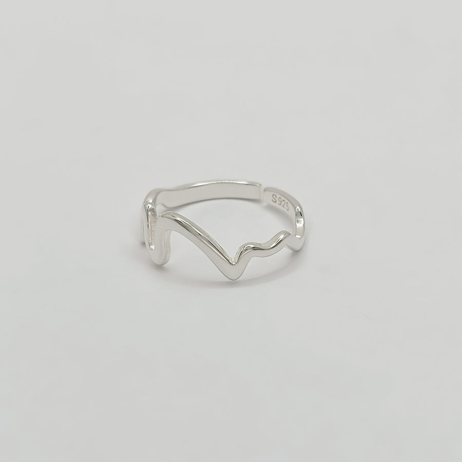 This unique 925 sterling silver ring features a wave-inspired open design, combining modern aesthetics with artistic flair. Adjustable and lightweight, this ring is a versatile accessory that complements any casual or formal look. 