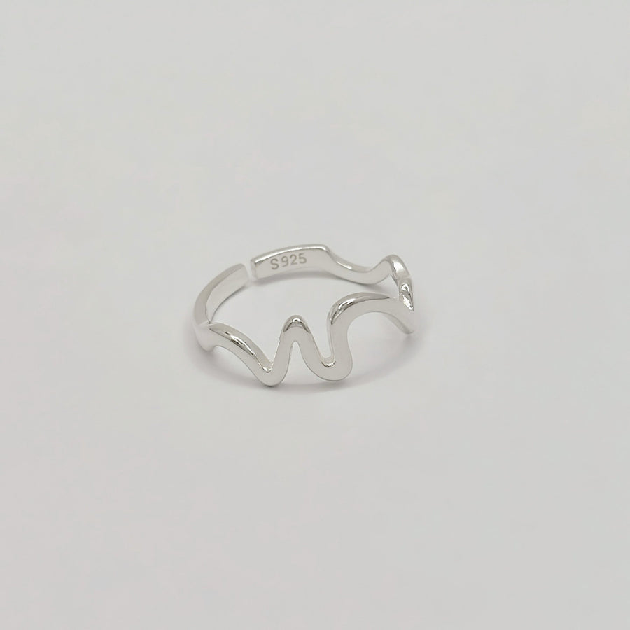 This unique 925 sterling silver ring features a wave-inspired open design, combining modern aesthetics with artistic flair. Adjustable and lightweight, this ring is a versatile accessory that complements any casual or formal look. 