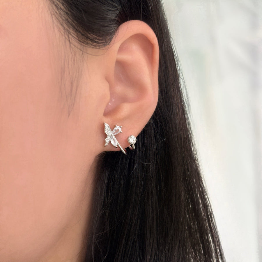 Crafted with sparkling cubic zircon and delicate silver details, these whimsical butterflies are perfect for adding elegance and charm to any look. A must-have for those who love a touch of nature's beauty.