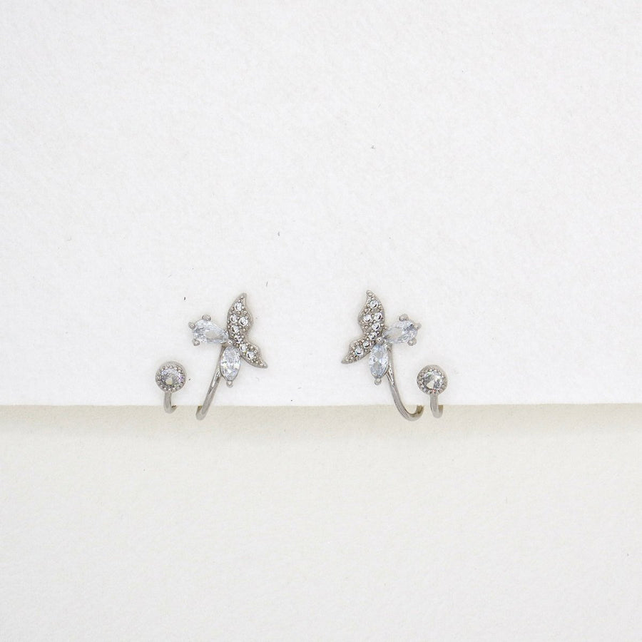 Crafted with sparkling cubic zircon and delicate silver details, these whimsical butterflies are perfect for adding elegance and charm to any look. A must-have for those who love a touch of nature's beauty.