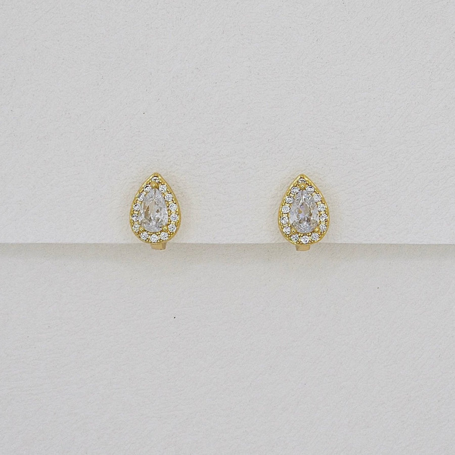 Crafted with elegance in mind, these teardrop-shaped earrings feature a dazzling central cubic zircon surrounded by a halo of shimmering cubic zircon. Perfect for adding a touch of glamour to any outfit