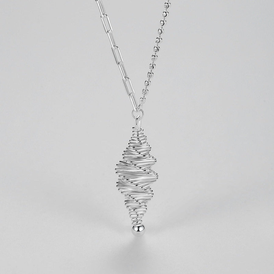 Elevate your style with this exquisite 925 sterling silver necklace, featuring a unique spiral-shaped pendant. The pendant showcases a series of tightly coiled silver strands, forming an intriguing helical design. This modern twist on classic elegance makes it a standout piece in any jewelry collection.