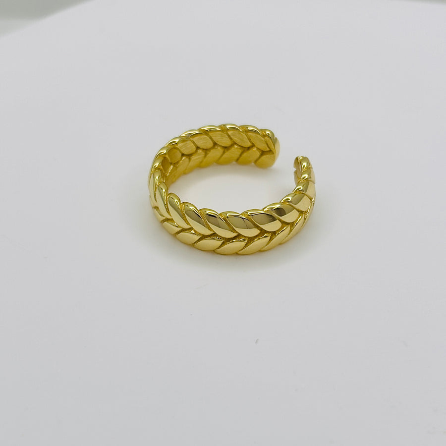 The gold vermeil braided ring blends modern style with a bold wheat braid pattern, making it the perfect statement accessory for any outfit. silver ring