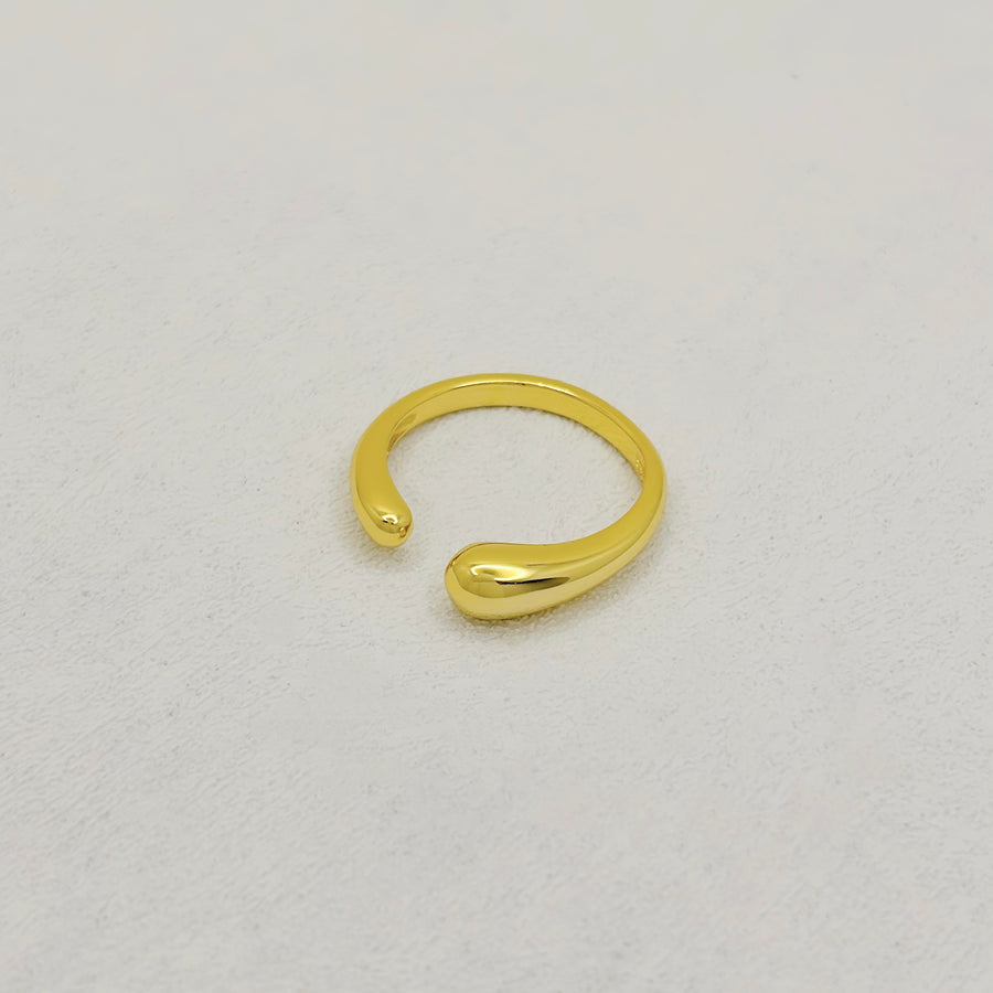 gold vermeil open ring. Elegant and modern, this open gold ring features a sleek, minimalist design that adds a touch of sophistication to any look.