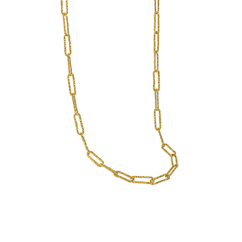 This elegant necklace features elongated, rectangular links crafted from high-quality silver, giving it a modern and sophisticated look. The textured finish on each link adds a unique touch, making it a perfect accessory for both casual and formal occasions.